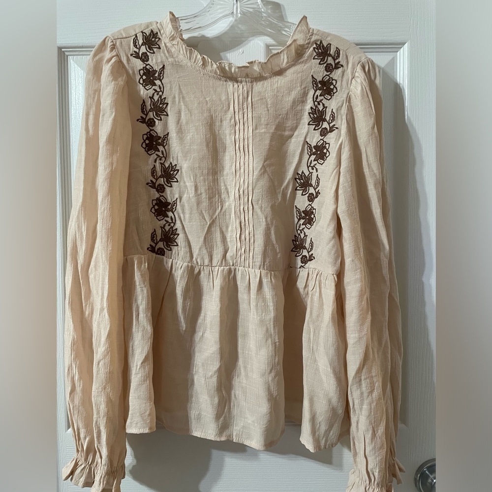 Cream with brown floral blouse